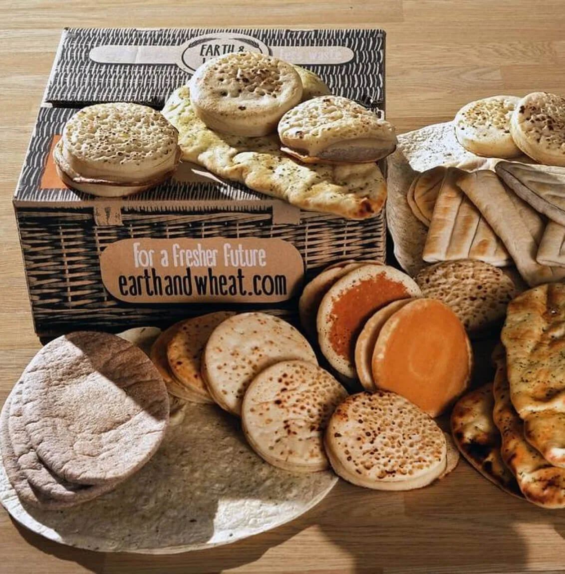 Earth & Wheat baked goods in a wooden crate