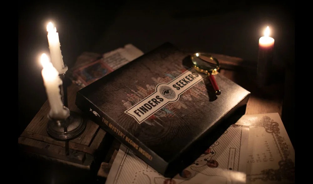 A Finders Seekers game lit by candlelight