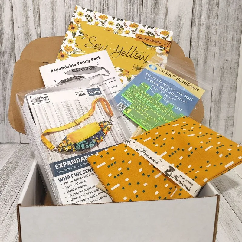 A Sew What Box of patterns and fabric